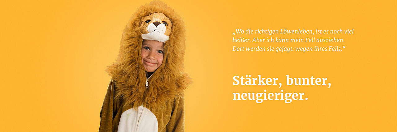 Banner_Frühförderung_gelb Frühförderung - Kind in einem Löwenkostüm